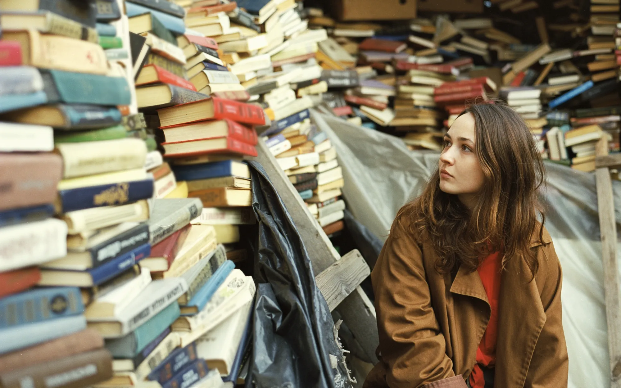 Woman with lots of books